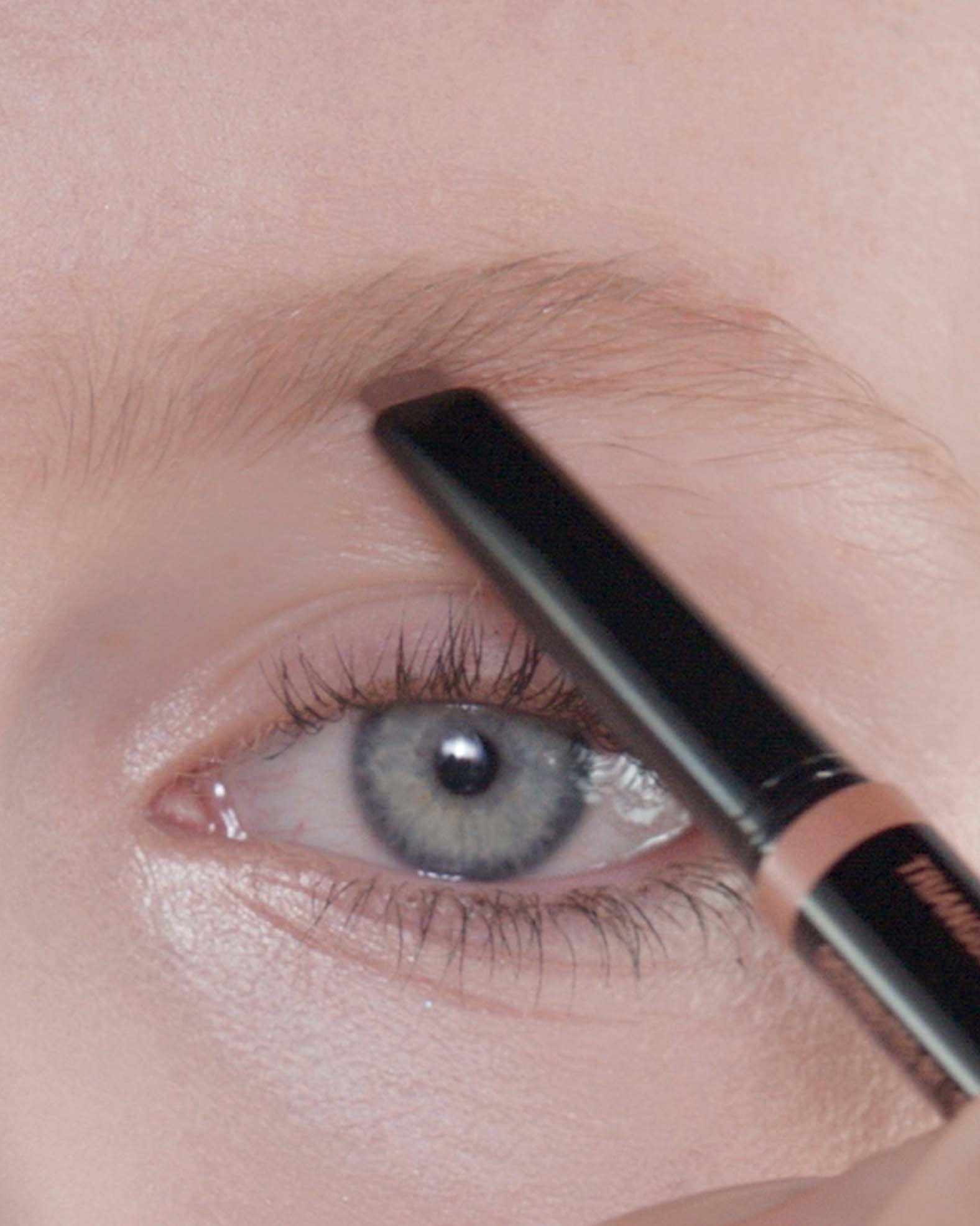 Applying Brow Powder Duo in Auburn