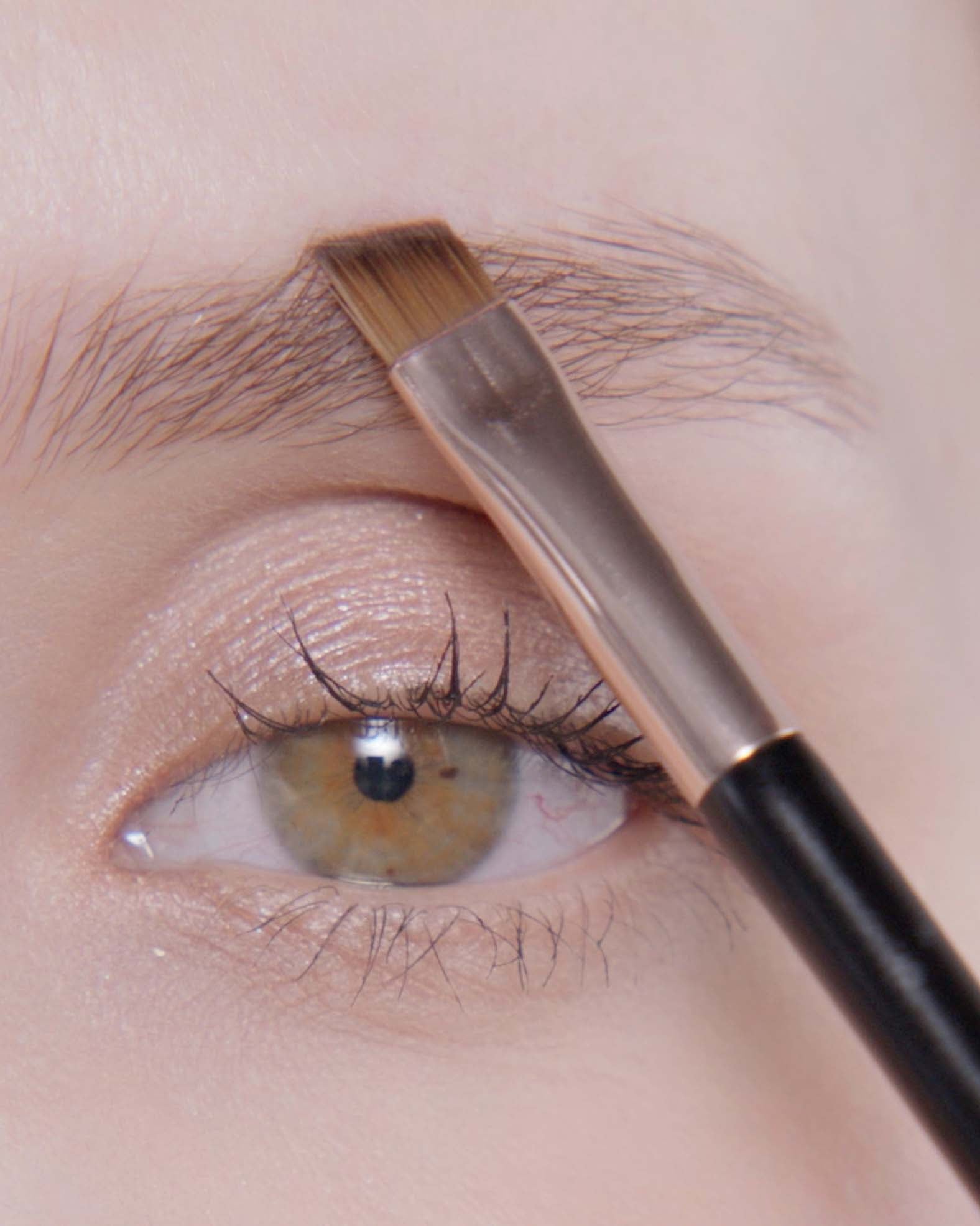 Applying Brow Powder Duo in Caramel