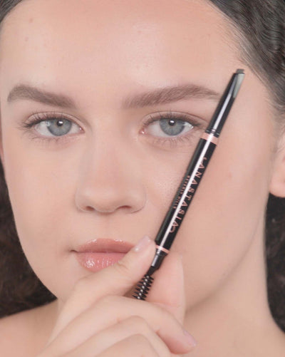 Applying Brow Definer in Ash Brown