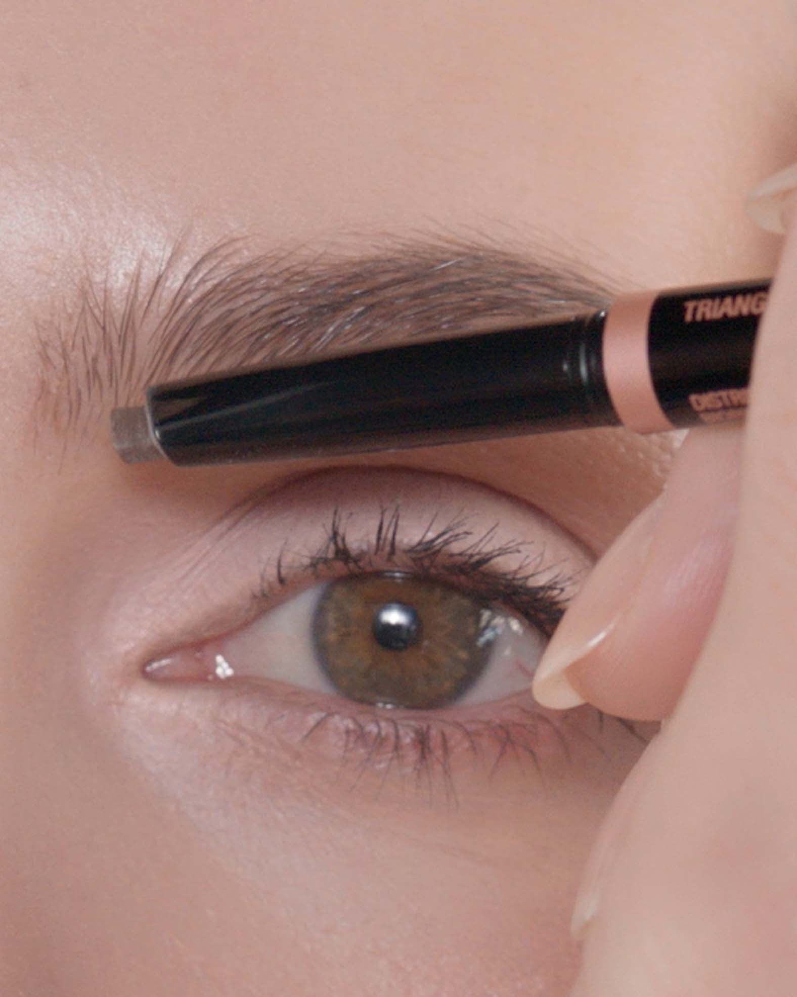 Applying Brow Definer in Caramel