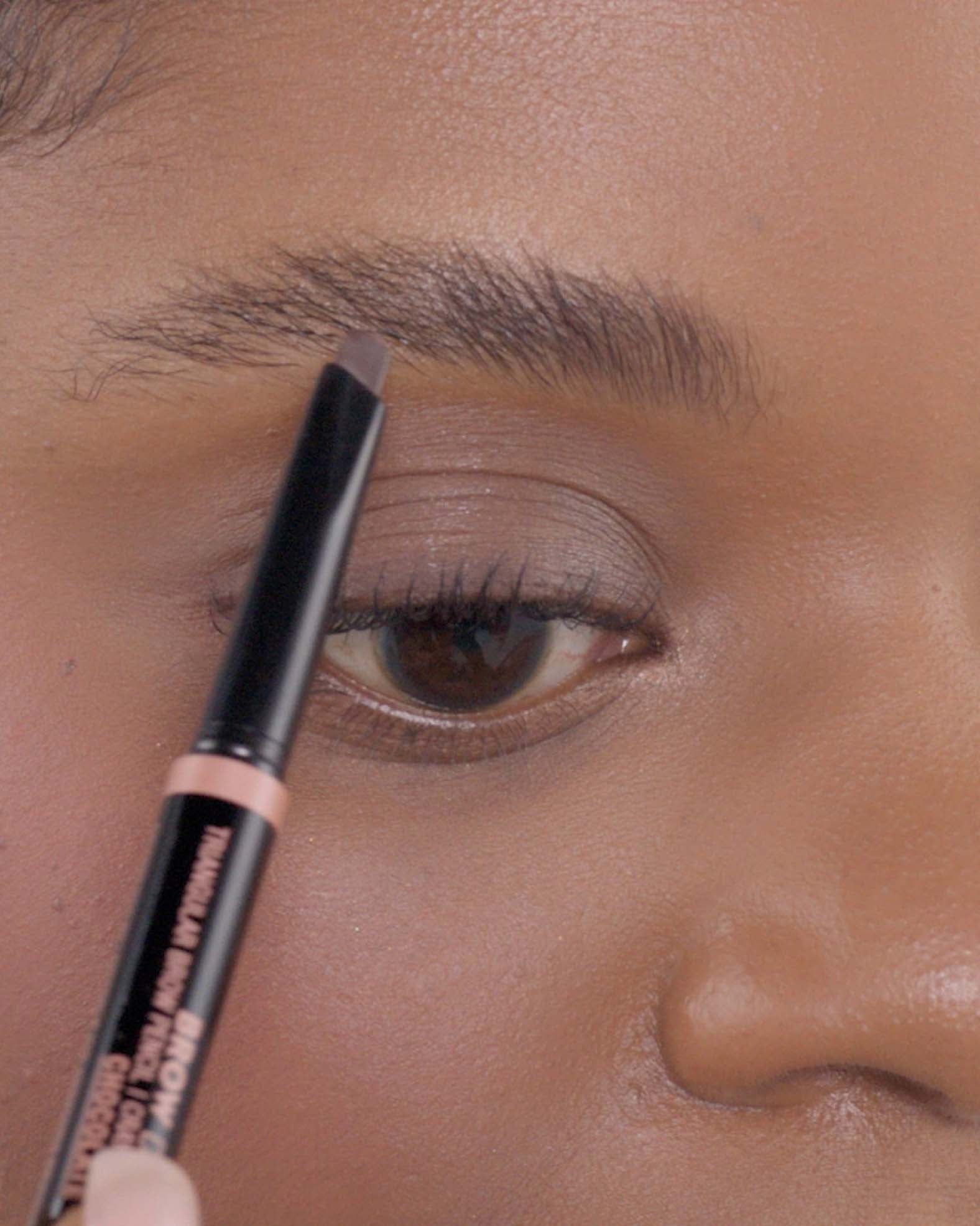 Applying Brow Definer in Chocolate