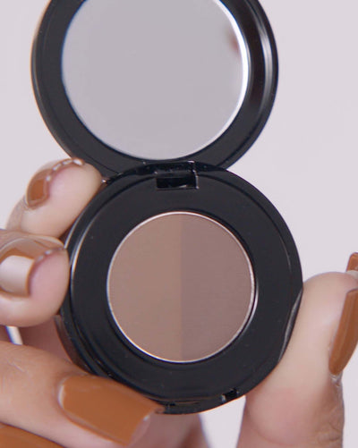 Applying Brow Powder Duo in Ebony