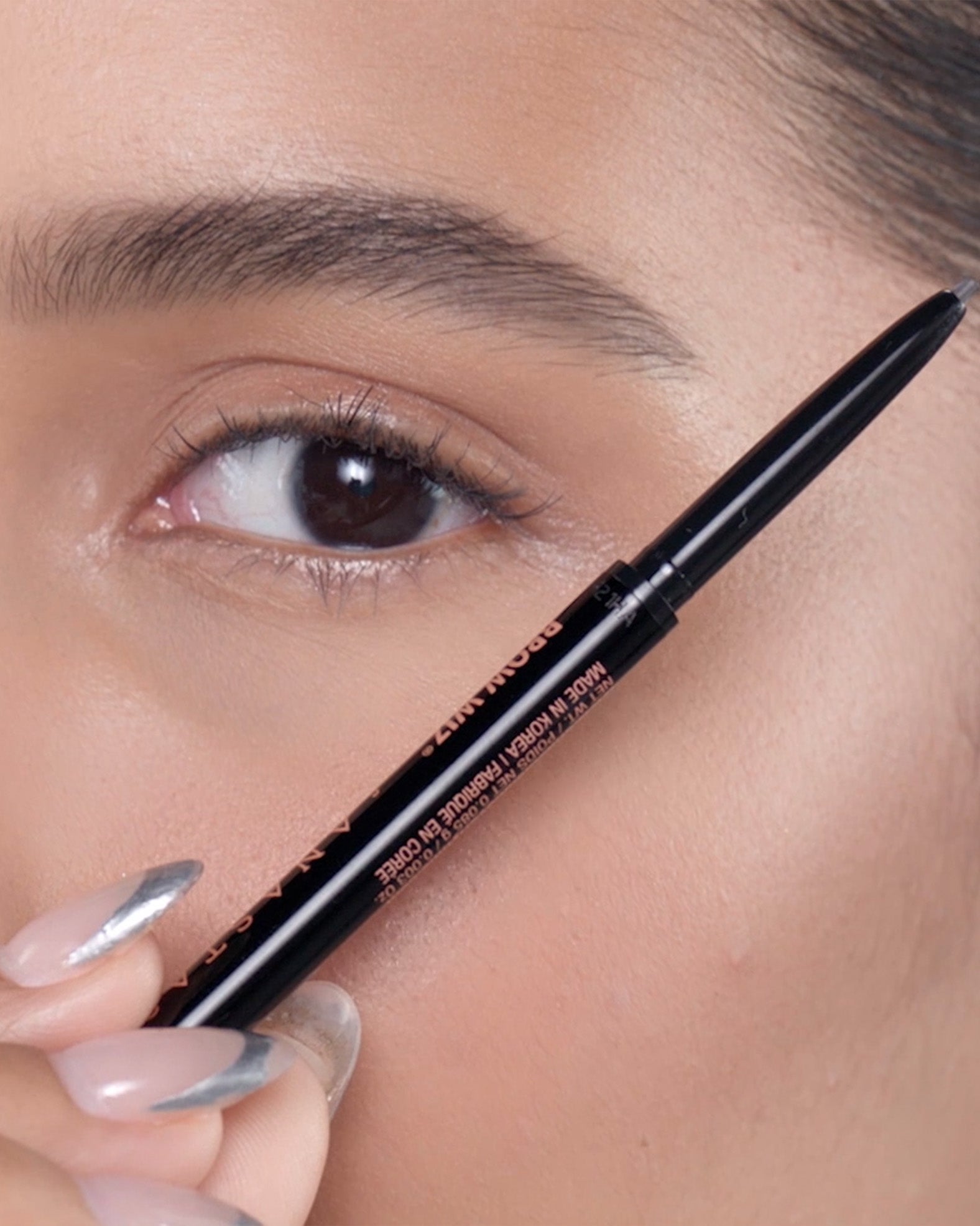 Applying Brow Wiz® in Dark Brown