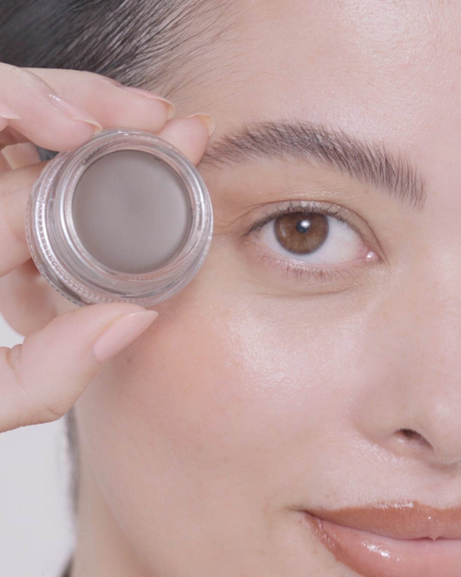 Applying Dipbrow Pomade in Ash Brown